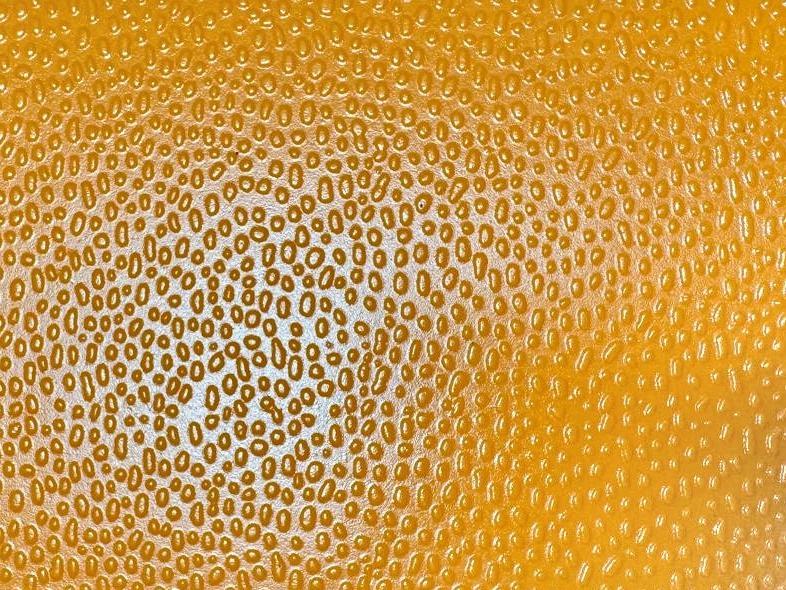 Detalhe da textura Bola de Basquete em chapa amarela
