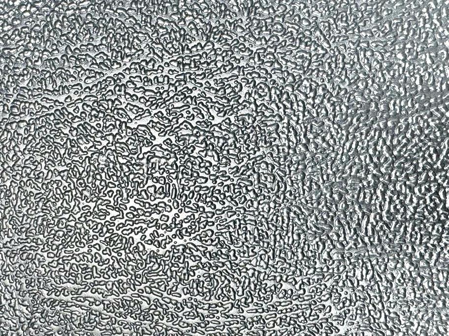 Detalhe da textura Haircell em chapa cinza
